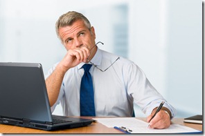 Pensive businessman - Image by flickr user s_falkow